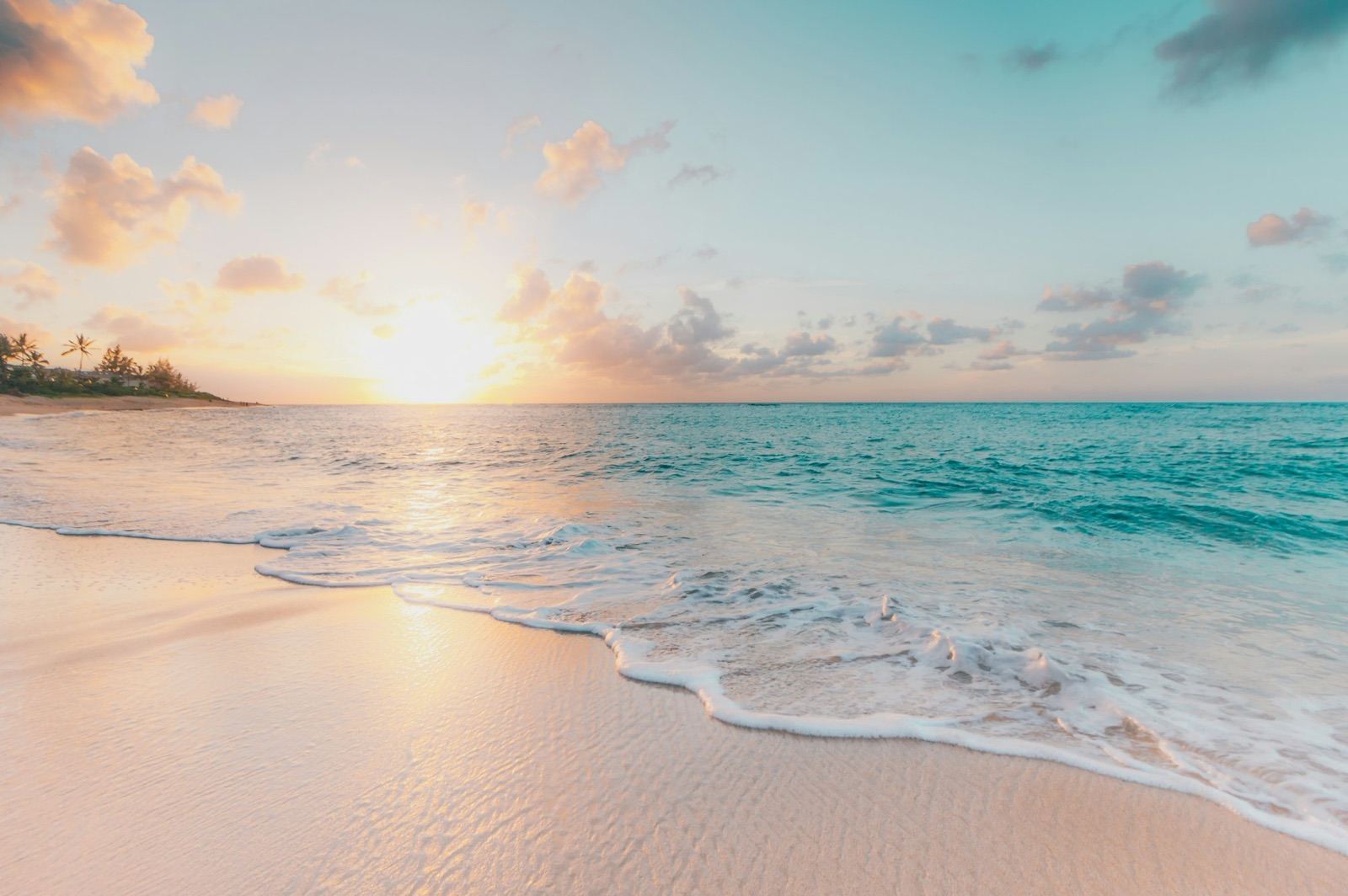 Turquoise ocean and white sand beach